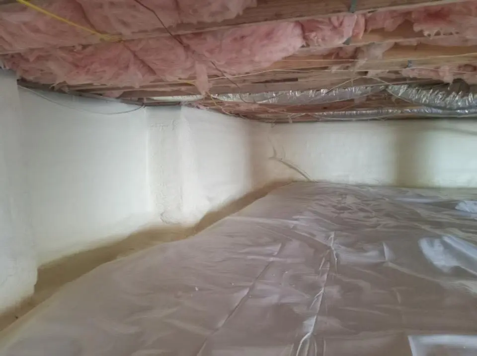 Crawl space encapsulation with closed-cell spray foam for Roof Leak Repair in Coralville